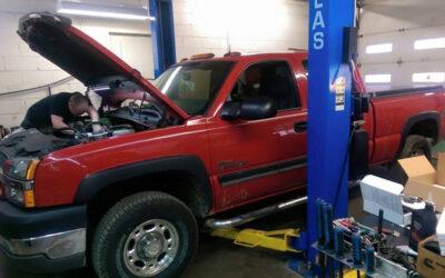 Red truck at auto repair shop